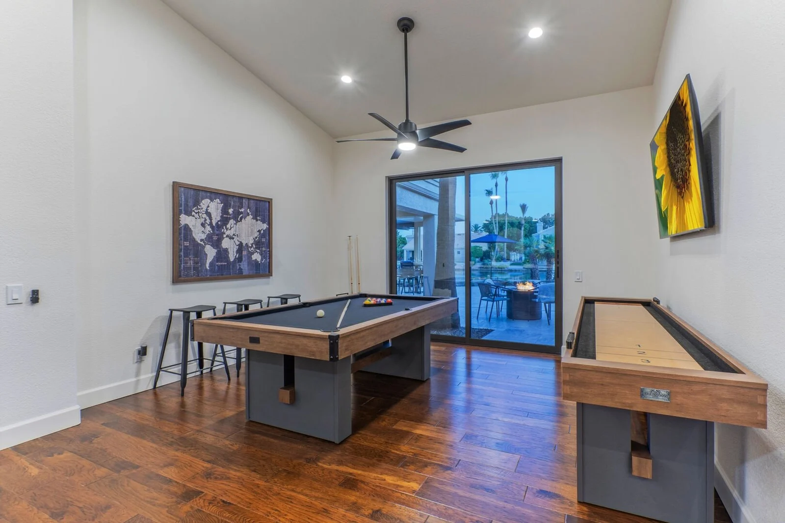 Game room with pool table and shuffleboard
