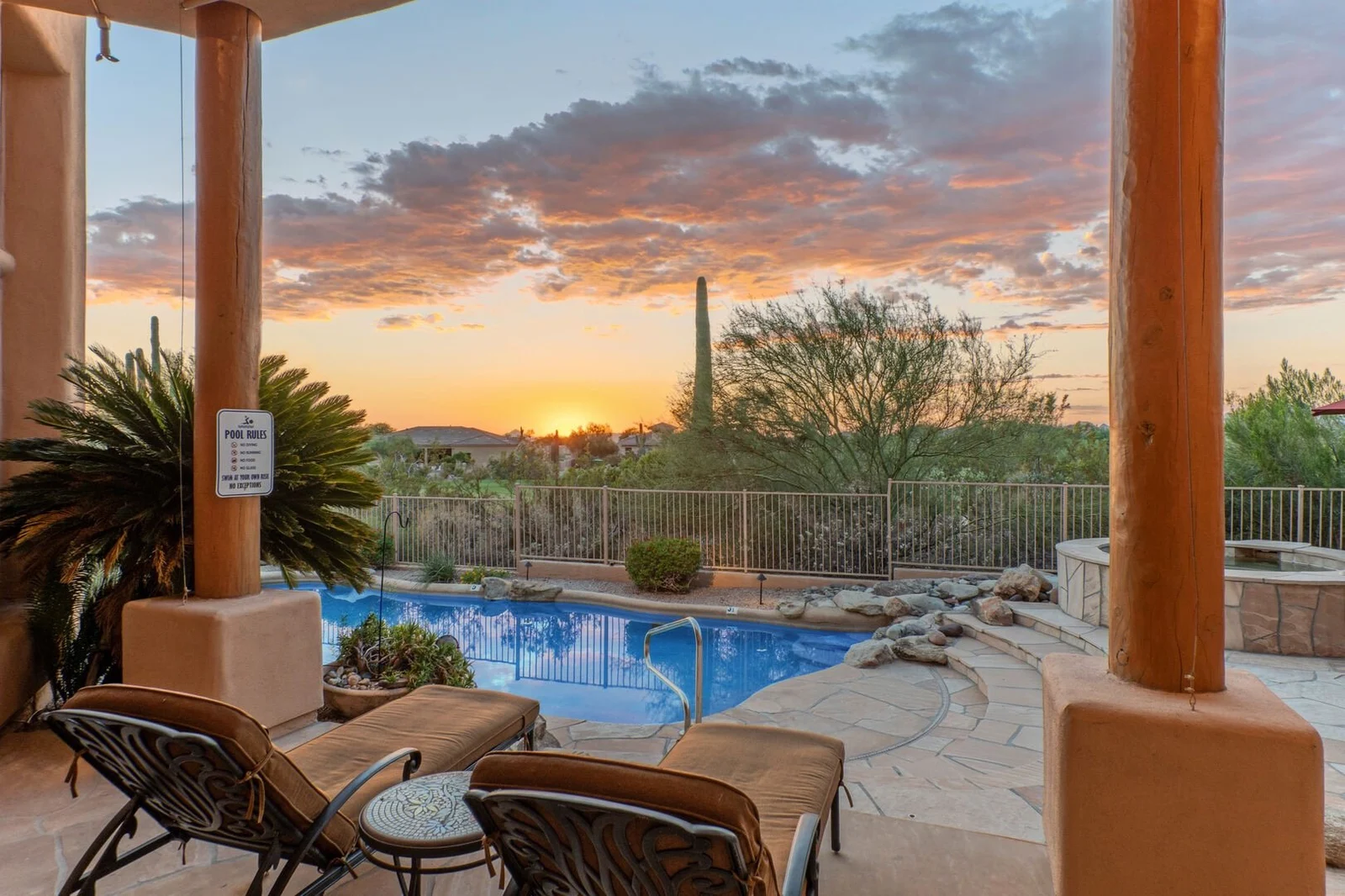 Pool and desert sunset at Arizona vacation rental